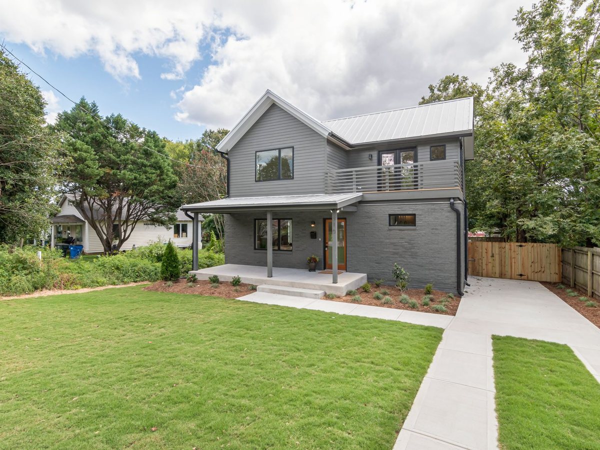 Clean residential backyard with an evenly maintained lawn